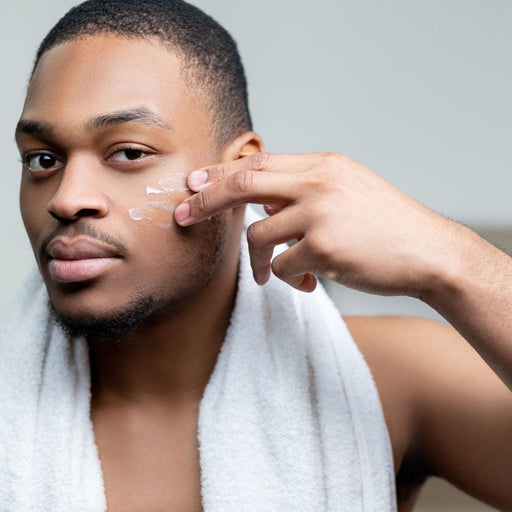 a man using ayer-medic skincare collection product