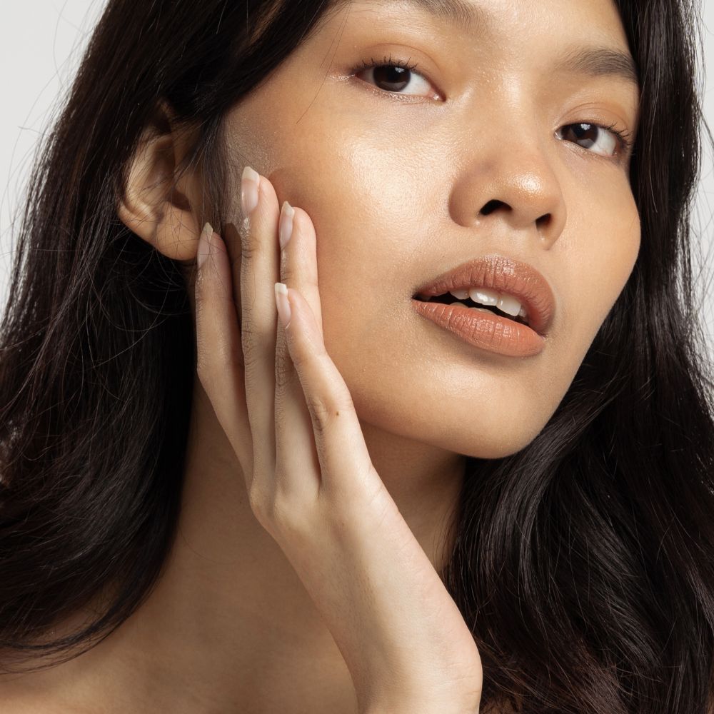 Model using sensitive skin skincare collection 