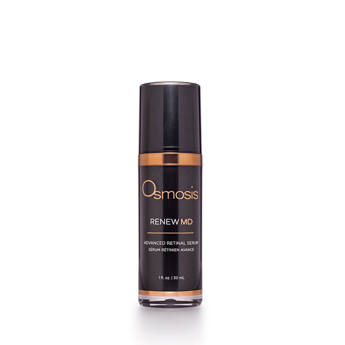 black and gold bottle of renew md advanced serum on white background